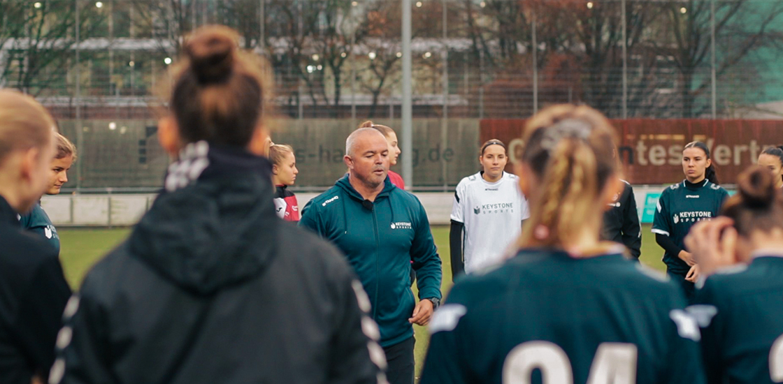 Athletic development expert coaching female soccer students