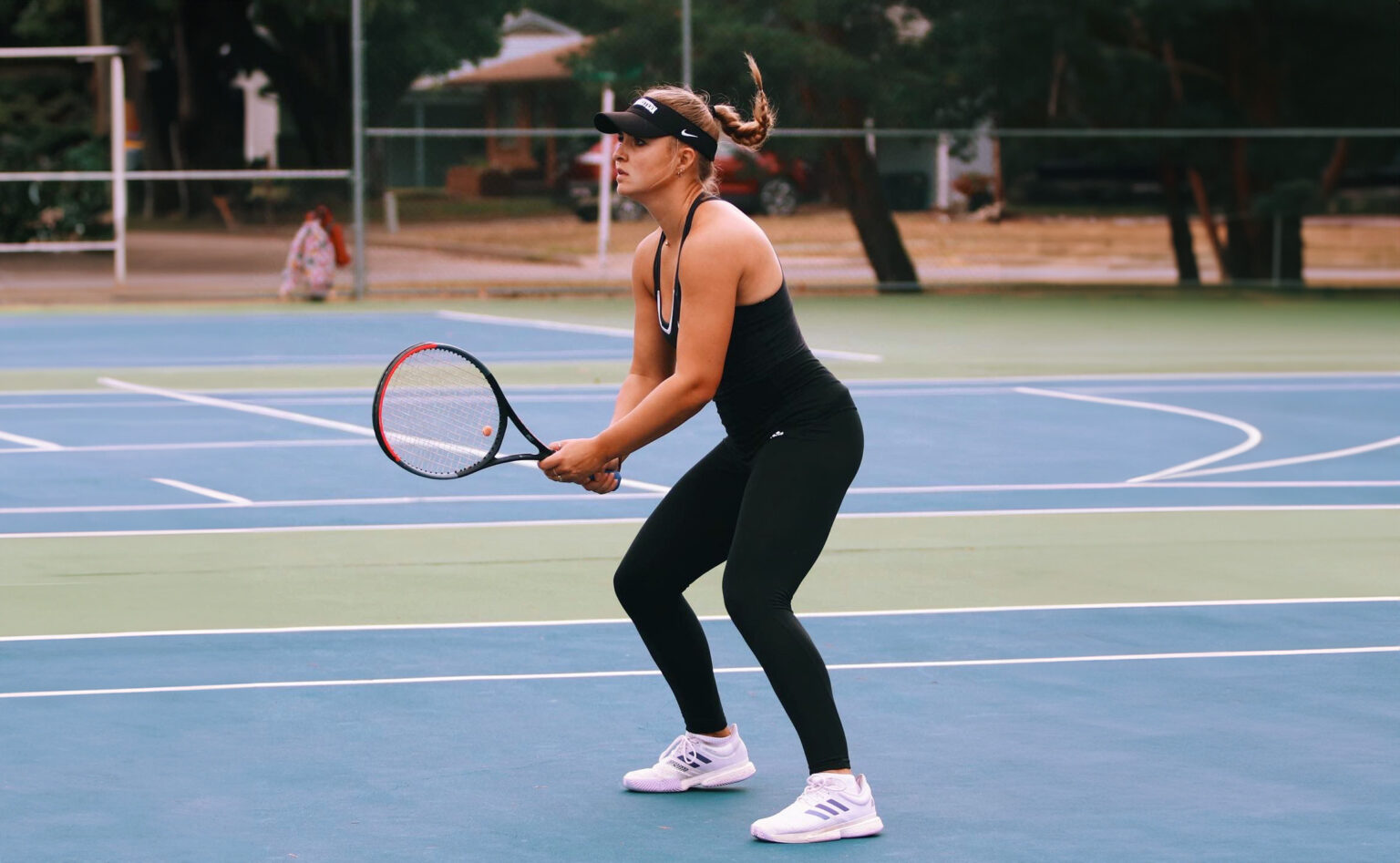 Tennis player Jasmin Hauska at tennis court