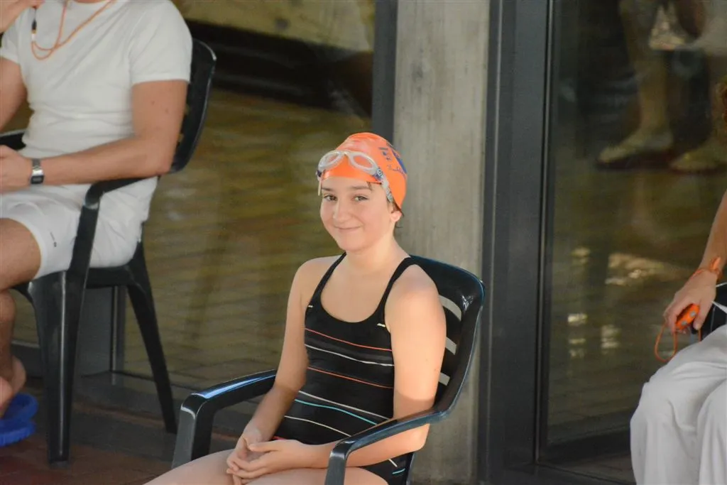 young helena robla sitting in a chair