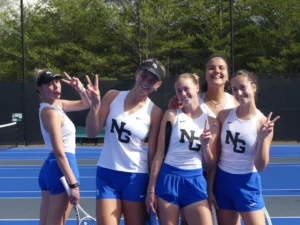 College tennis players from the University of North Georgia women’s team posing for a funny picture.