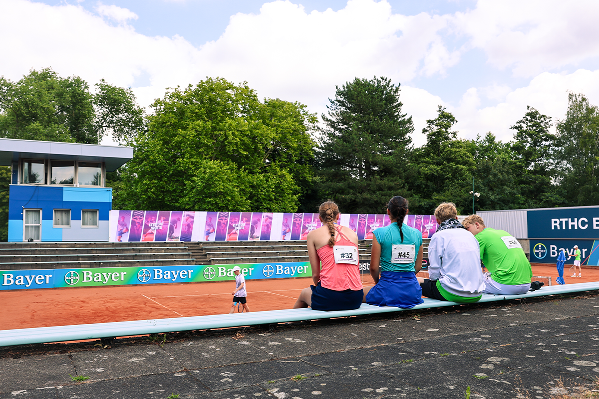 Tennis players watching a game at Keystone Sports' College Tennis Showcase 2025