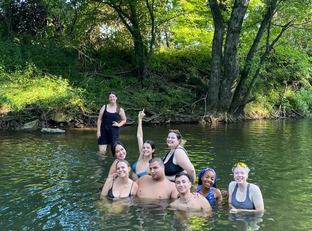 Candela Pérez and her friends at the river
