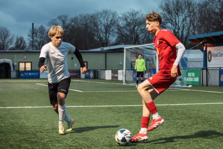 Two soccer players in a UK event